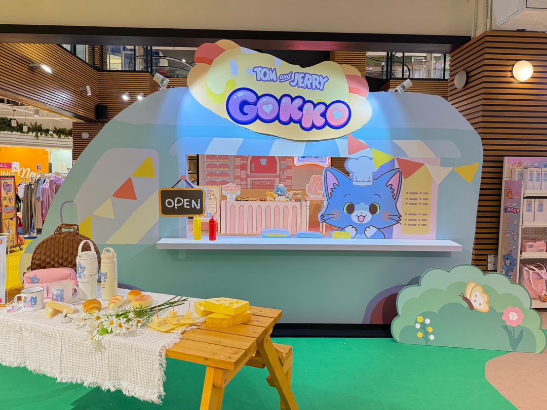 A collection of adorable Tom & Jerry themed merchandise, including plush toys and unique collectibles.