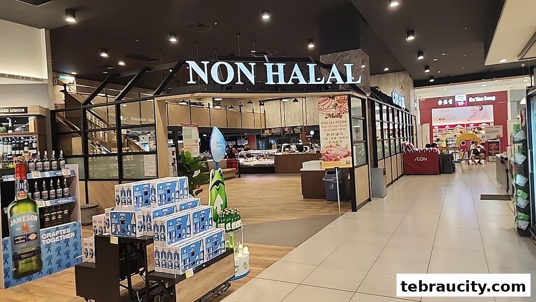 Interior view of a supermarket section with a prominent 'NON HALAL' sign and displays of liquor and fresh pork.