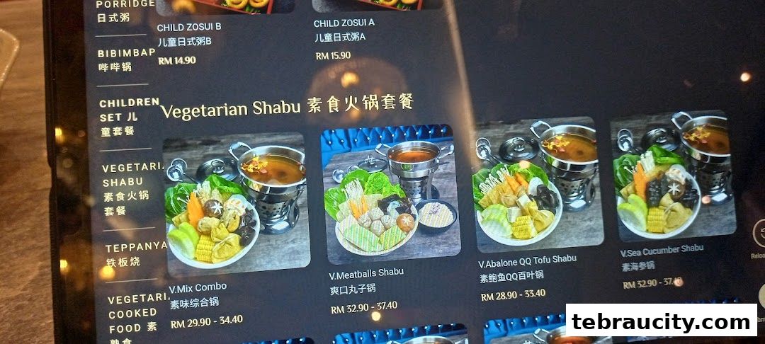 A digital menu displaying various shabu-shabu dishes with prices and images.