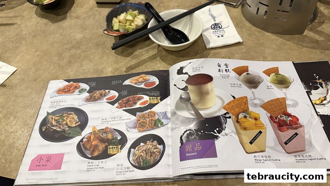 A menu open to a page showcasing various dishes and desserts with accompanying images.
