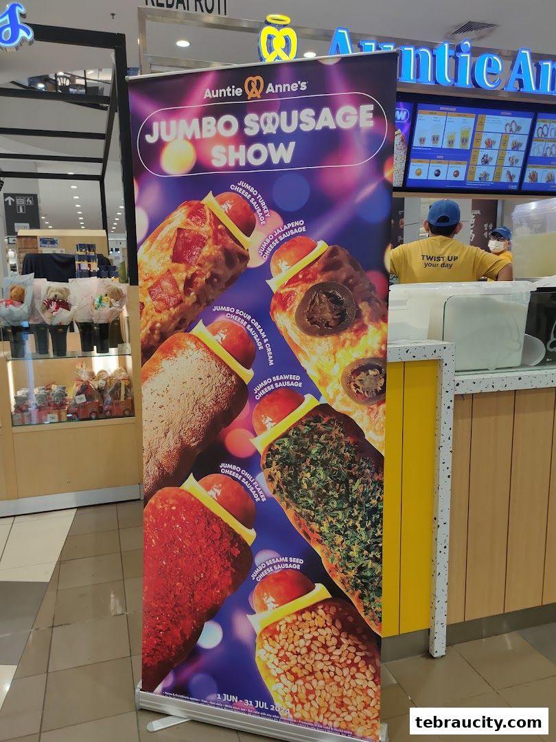 Auntie Anne's promotional banner for their Jumbo Sausage Show featuring various sausage flavors.