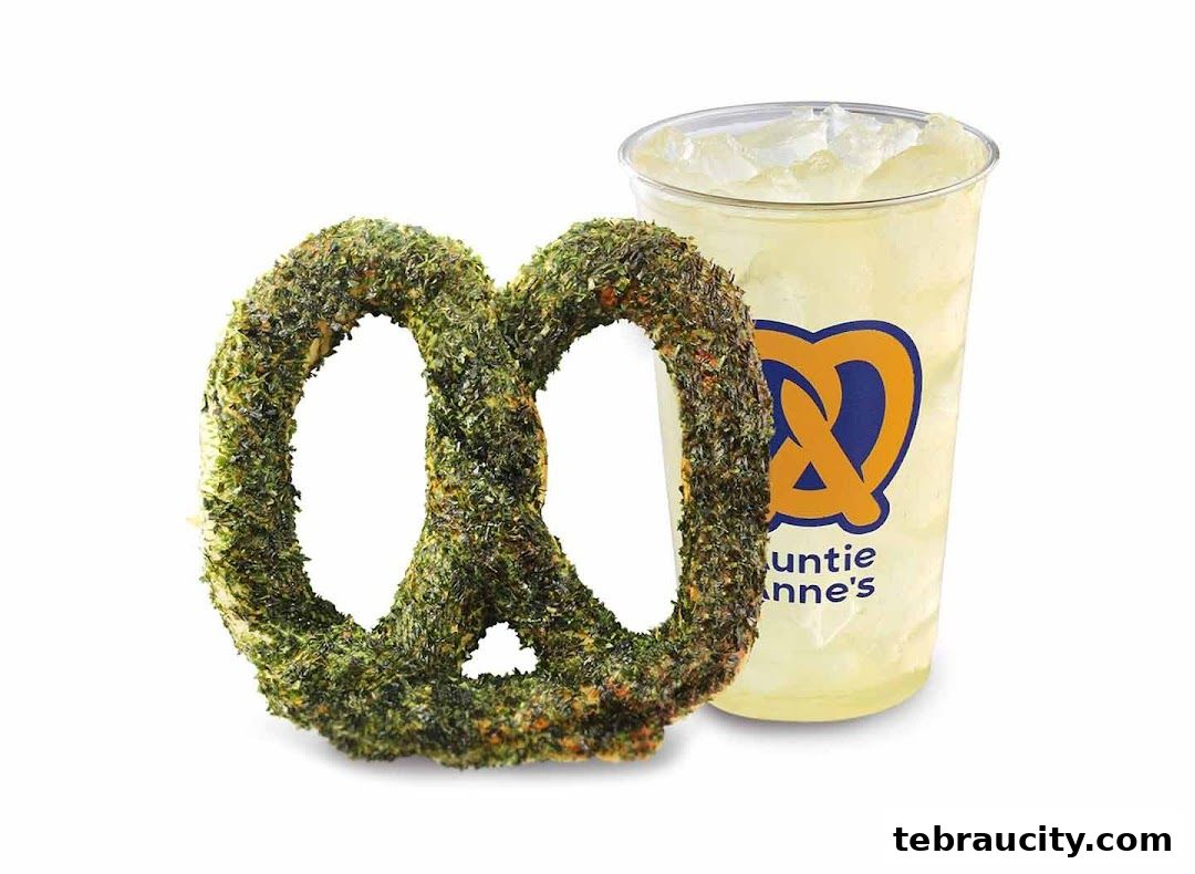 A seasoned pretzel and a lemonade drink from Auntie Anne's.
