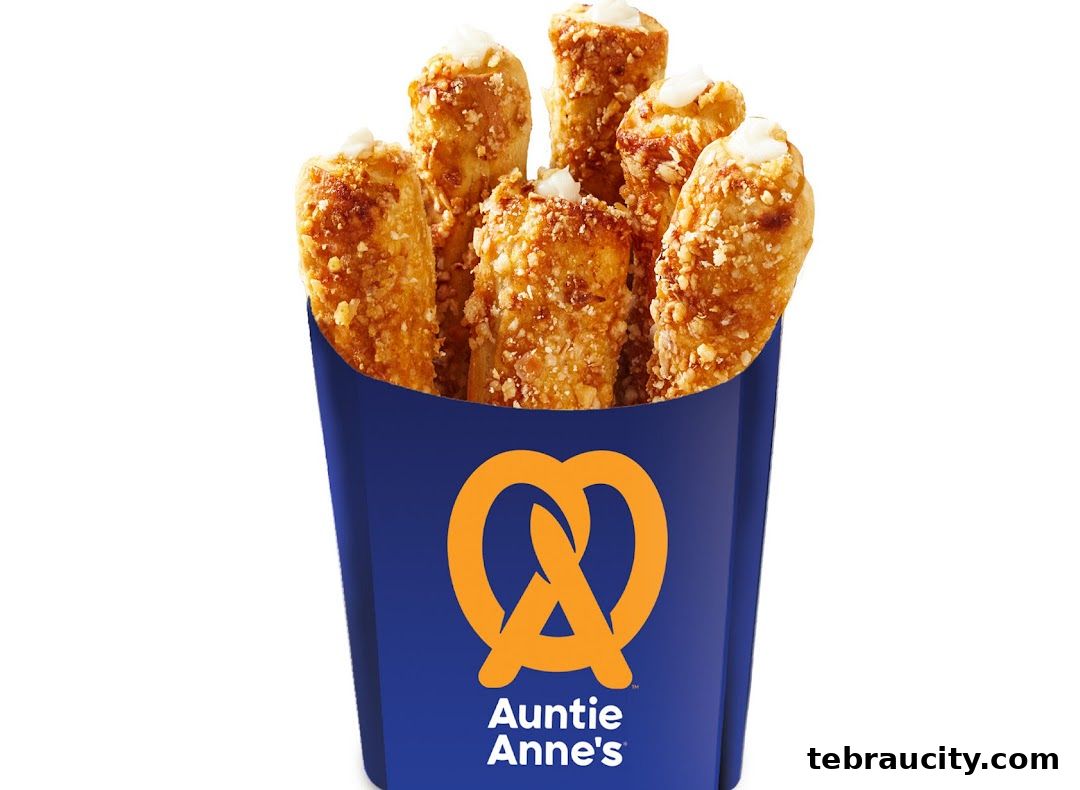 Auntie Anne's pretzel bites with a creamy dip in a branded blue container.
