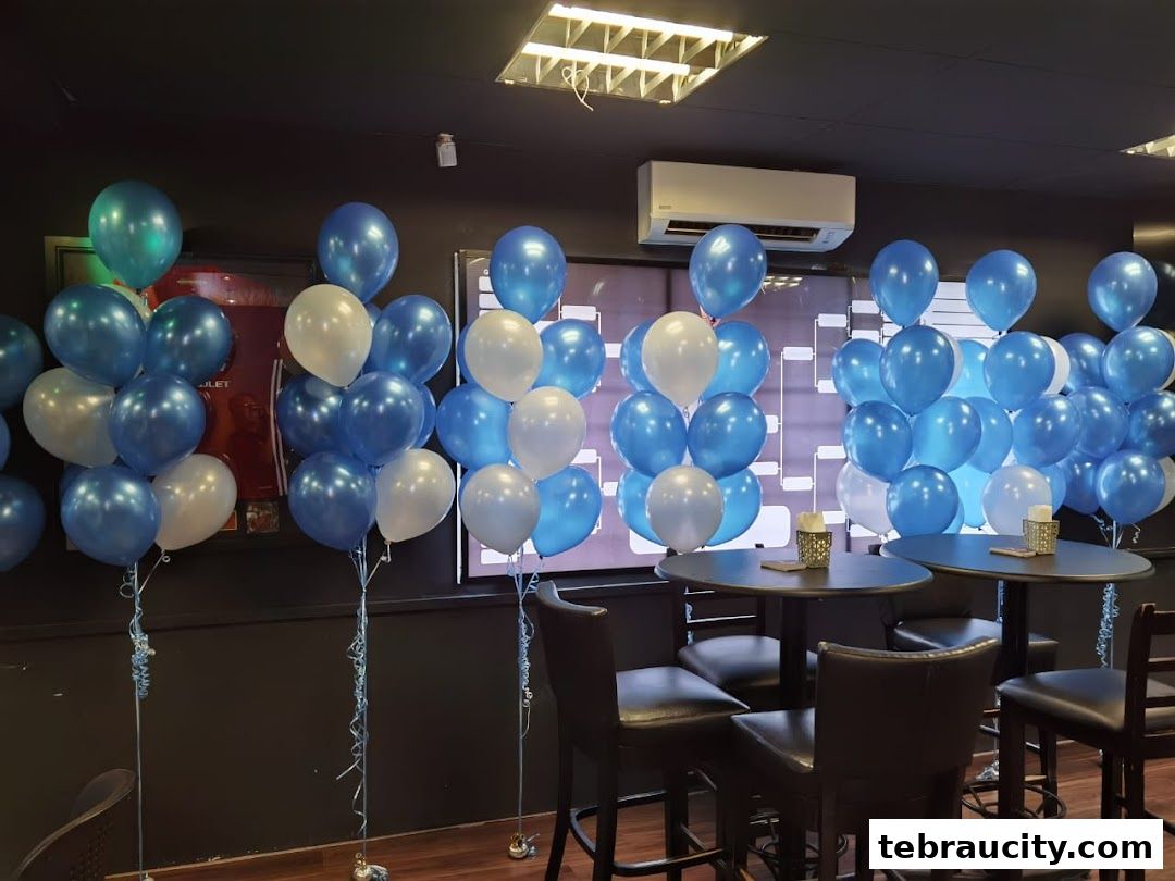 A collection of blue and white balloons arranged in bouquets inside a shop.