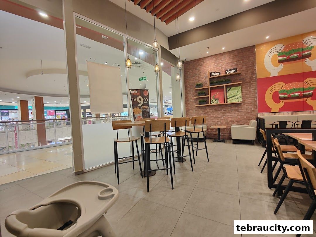 Interior view of a Burger King restaurant with seating and decor.