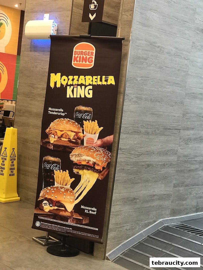 A Burger King banner advertising their Mozzarella King burgers with a cheese pull.