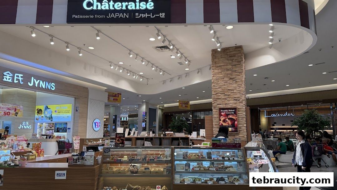 Châteraisé patisserie shop with display cases filled with pastries and cakes.