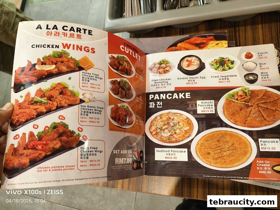 A menu from Chego Korean BBQ featuring chicken wings, cutlets, pancakes, and side dishes.