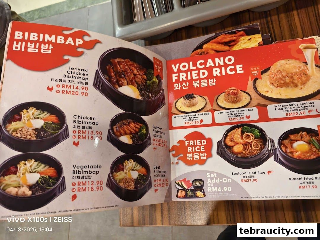 A menu showcasing Korean dishes like Bibimbap and Volcano Fried Rice with prices.
