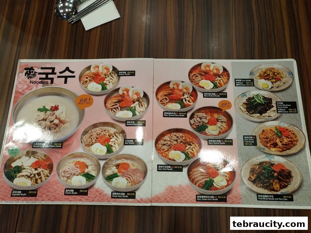 A menu showcasing various Korean noodle dishes with appetizing images and prices.