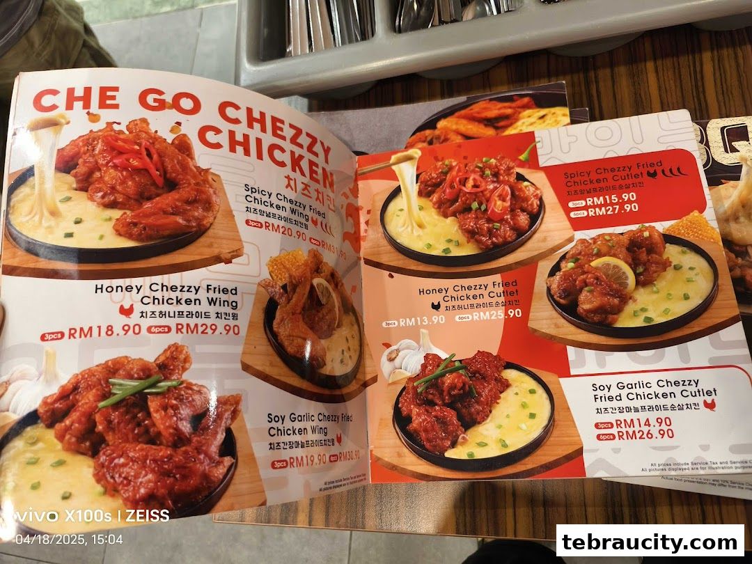 A menu showcasing Chego Korean BBQ's Cheezy Chicken dishes with prices.