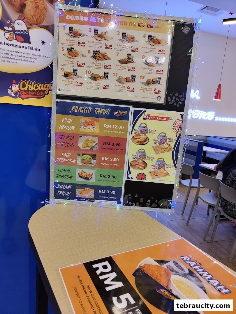 A menu board displaying various chicken combos, daily specials, and kid's meals at Chicago Chicken City.