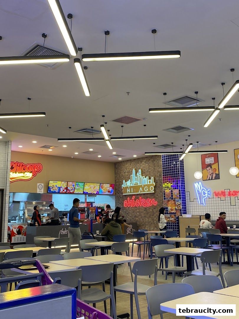 Interior view of Chicago Chicken City with dining tables and a counter area.
