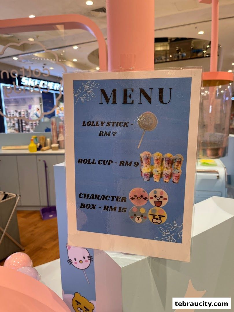 A menu board displaying prices for Lolly Stick, Roll Cup, and Character Box.