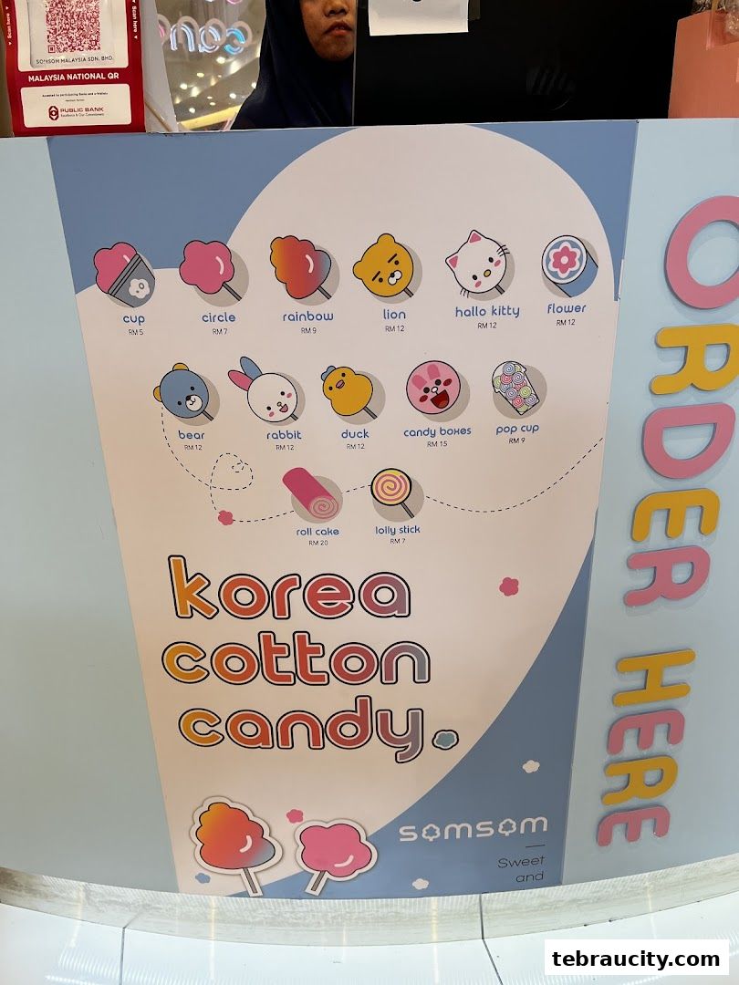 A menu board displaying various shapes and prices of Korean cotton candy.
