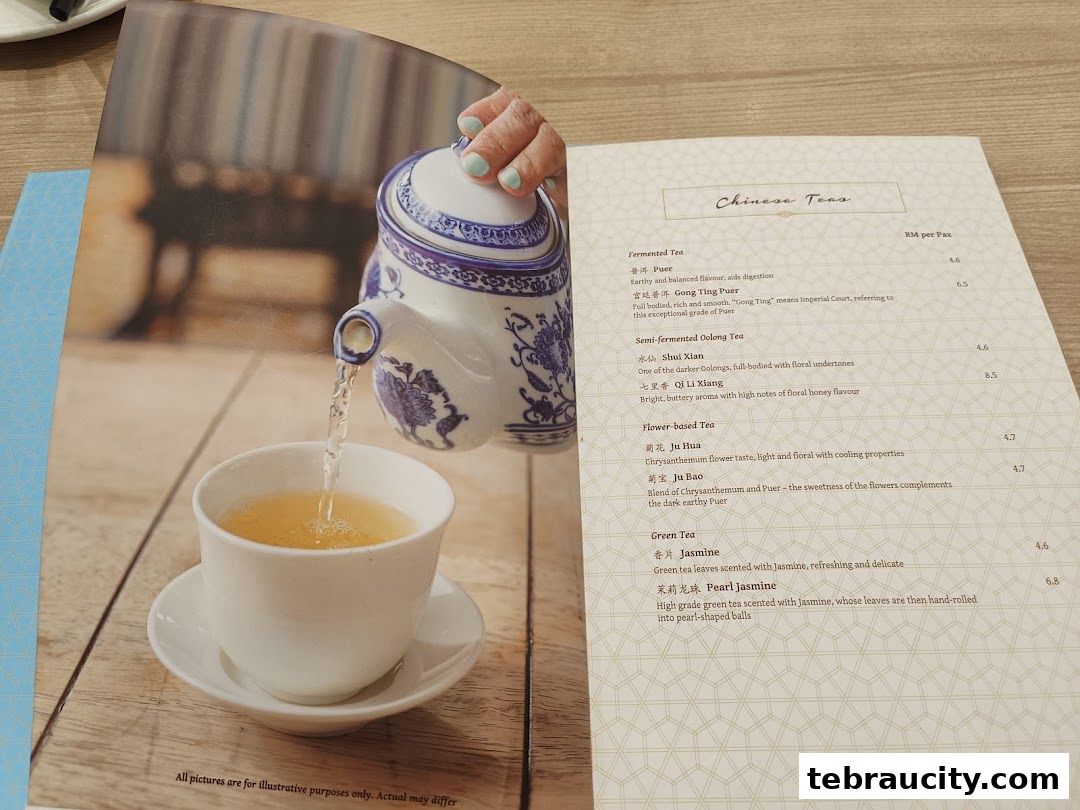 A menu featuring Chinese teas with descriptions and prices, alongside an image of tea being poured.