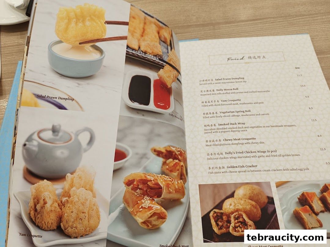 A menu from Dolly Dim Sum featuring various fried dim sum dishes with accompanying images.