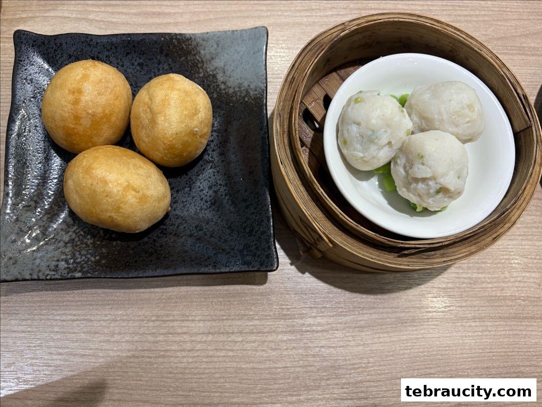 Two plates of dim sum, one with fried balls and the other with steamed fish balls.
