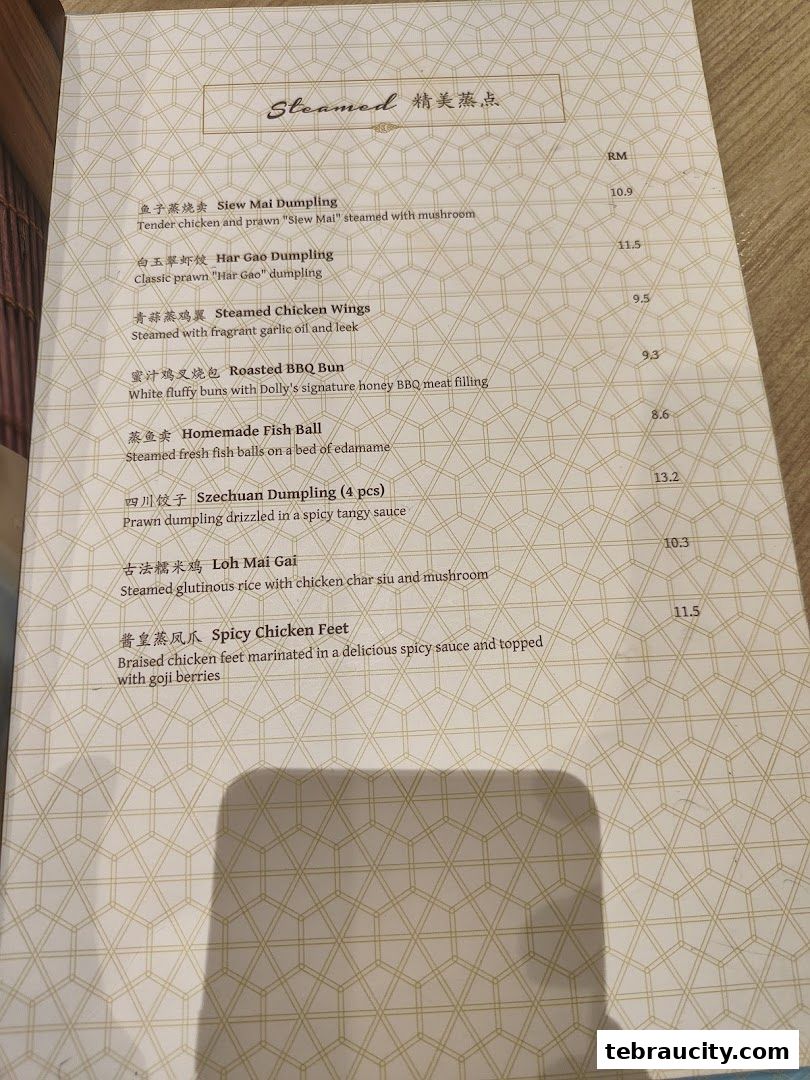 A menu page from Dolly Dim Sum featuring a selection of steamed dim sum dishes.