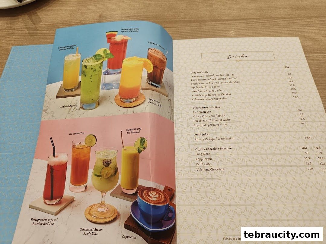 A menu page from Dolly Dim Sum featuring colorful drinks and coffee selections.