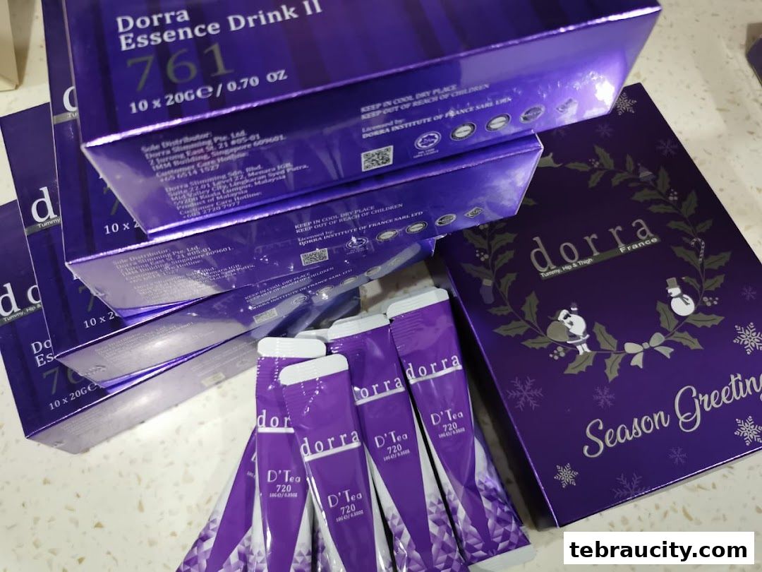 A collection of Dorra slimming products, including drinks and tea sachets, with festive packaging.