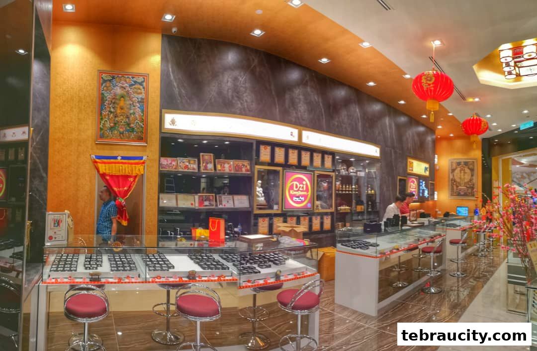 Interior view of a jewelry store with display cases, seating, and decorative elements.