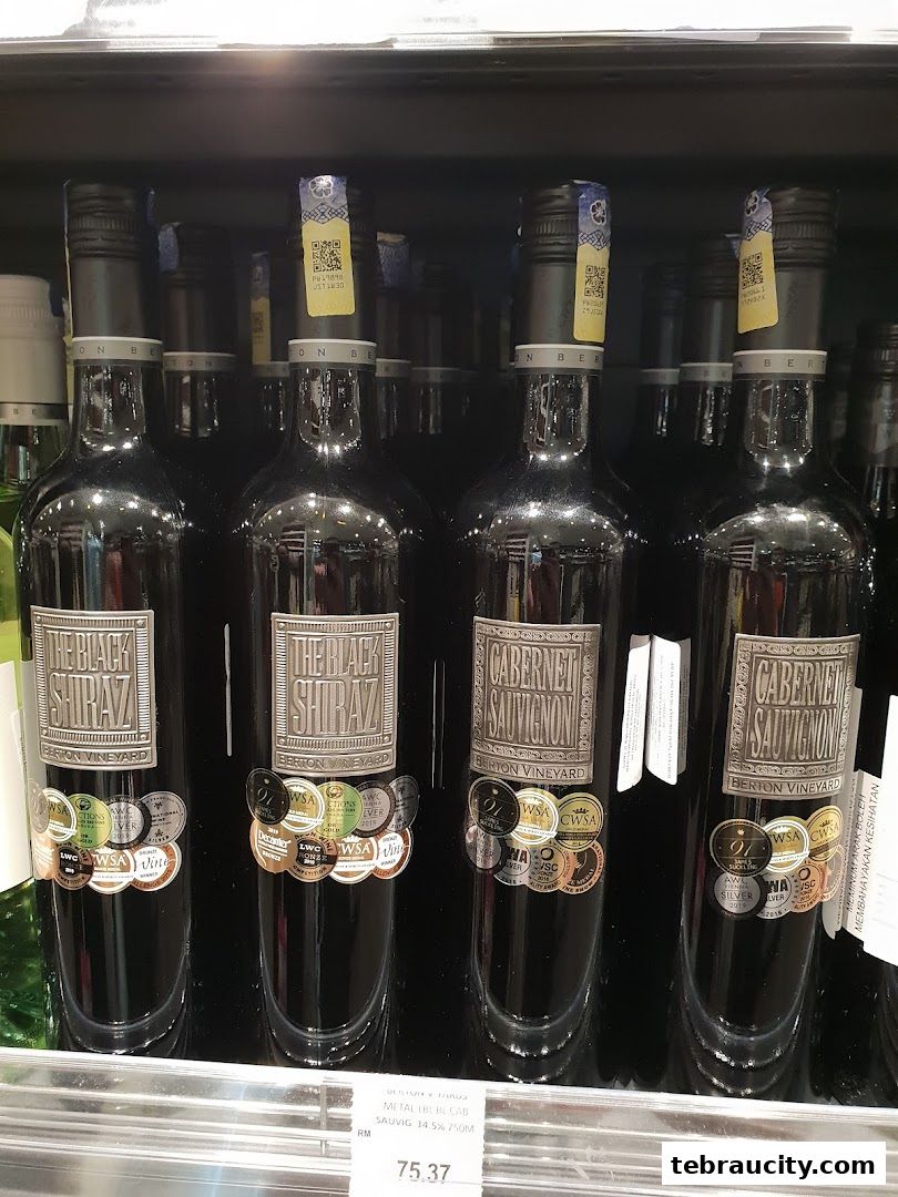 Bottles of Shiraz and Cabernet Sauvignon wine from Berton Vineyard displayed on a shelf.