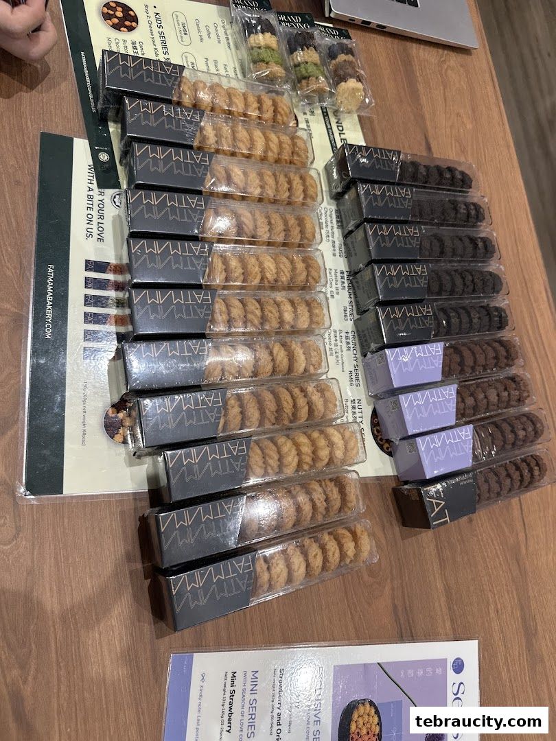 A display of individually packaged cookies from Fatmama Bakery, neatly arranged on a table.
