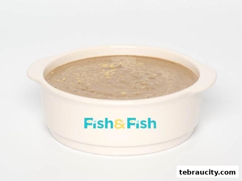 A bowl of creamy soup with the Fish & Fish logo on the side.
