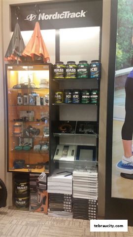 Display of NordicTrack fitness equipment, supplements, and accessories.