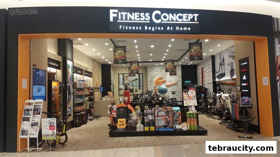The entrance of Fitness Concept, a store selling home fitness equipment, with various machines on display.