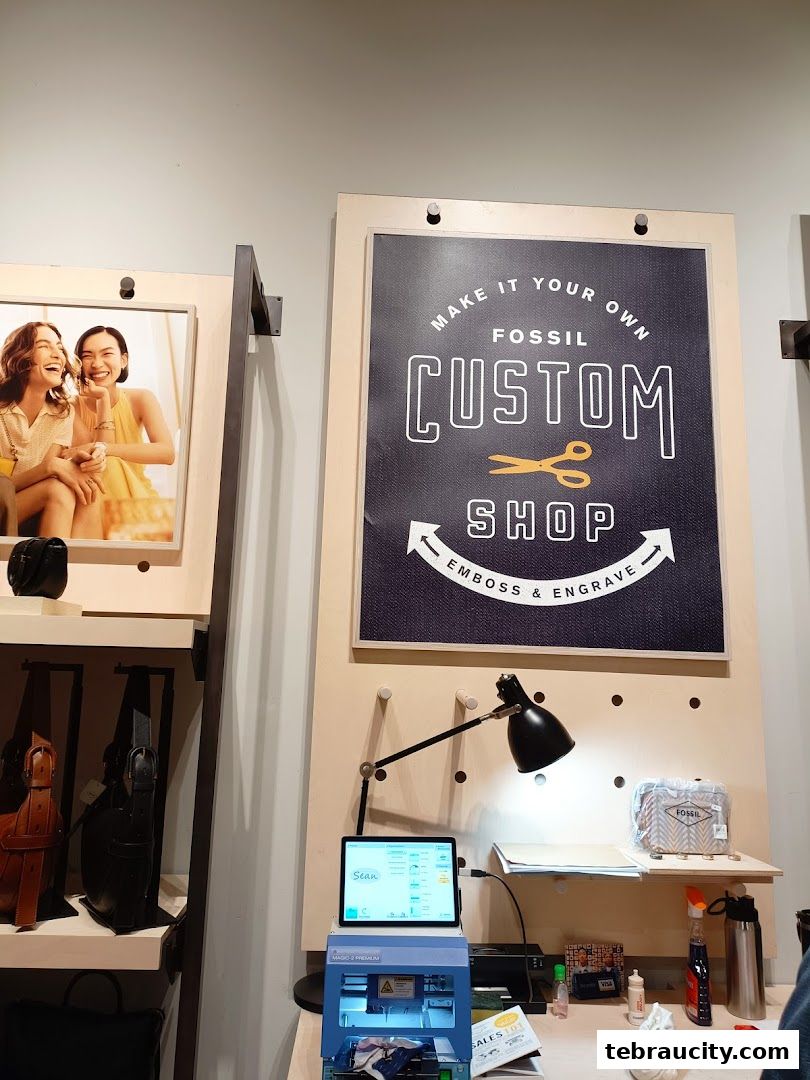 Fossil store display featuring a custom shop for embossing and engraving.