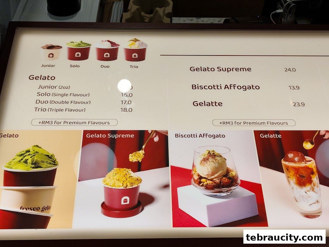 A menu board displaying various gelato flavors and specialty drinks with prices.