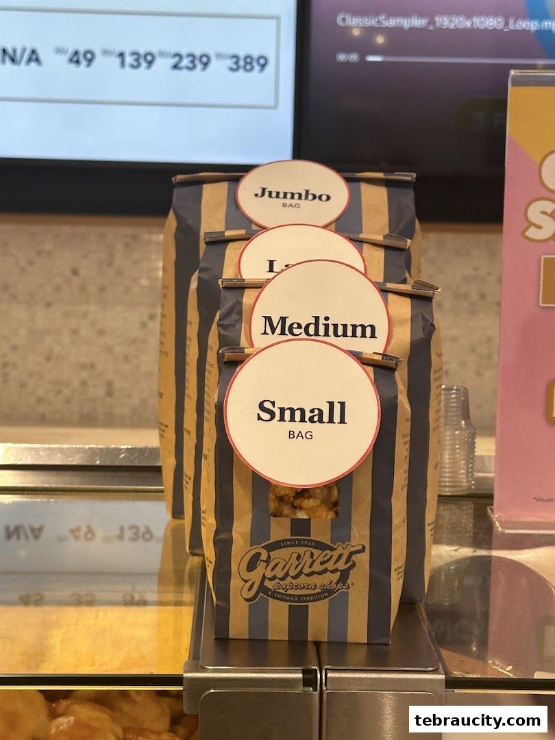 Garrett Popcorn Shops bags labeled Small, Medium, Large, and Jumbo.