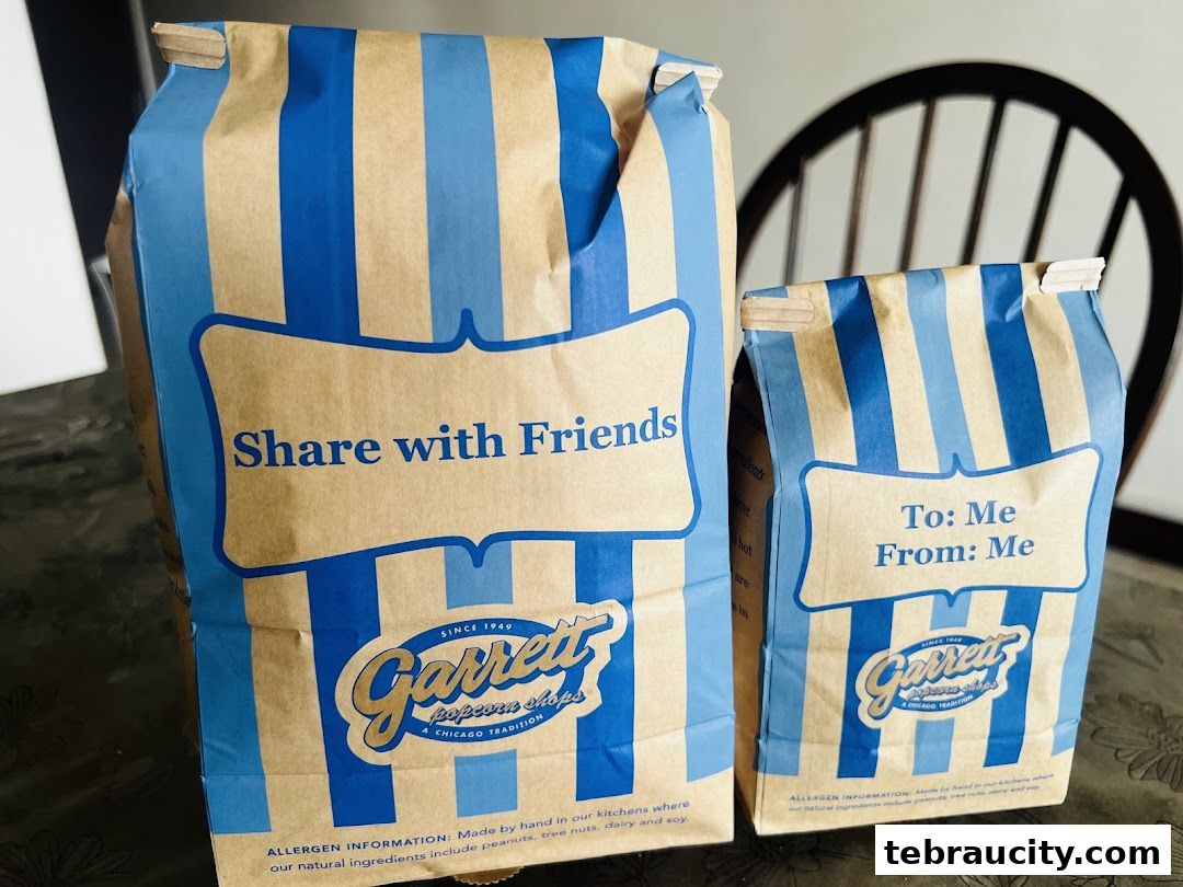 Two bags of Garrett Popcorn Shops popcorn, one labeled 'Share with Friends' and the other 'To: Me From: Me'.