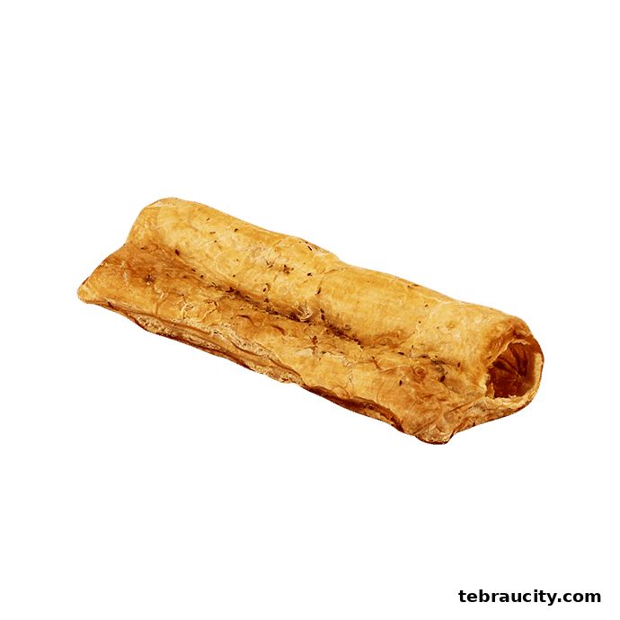 A close-up shot of a golden-brown, flaky pastry roll with visible herbs.