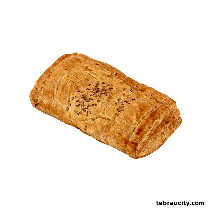 A golden-brown pastry with visible seeds on top, isolated on a green background.