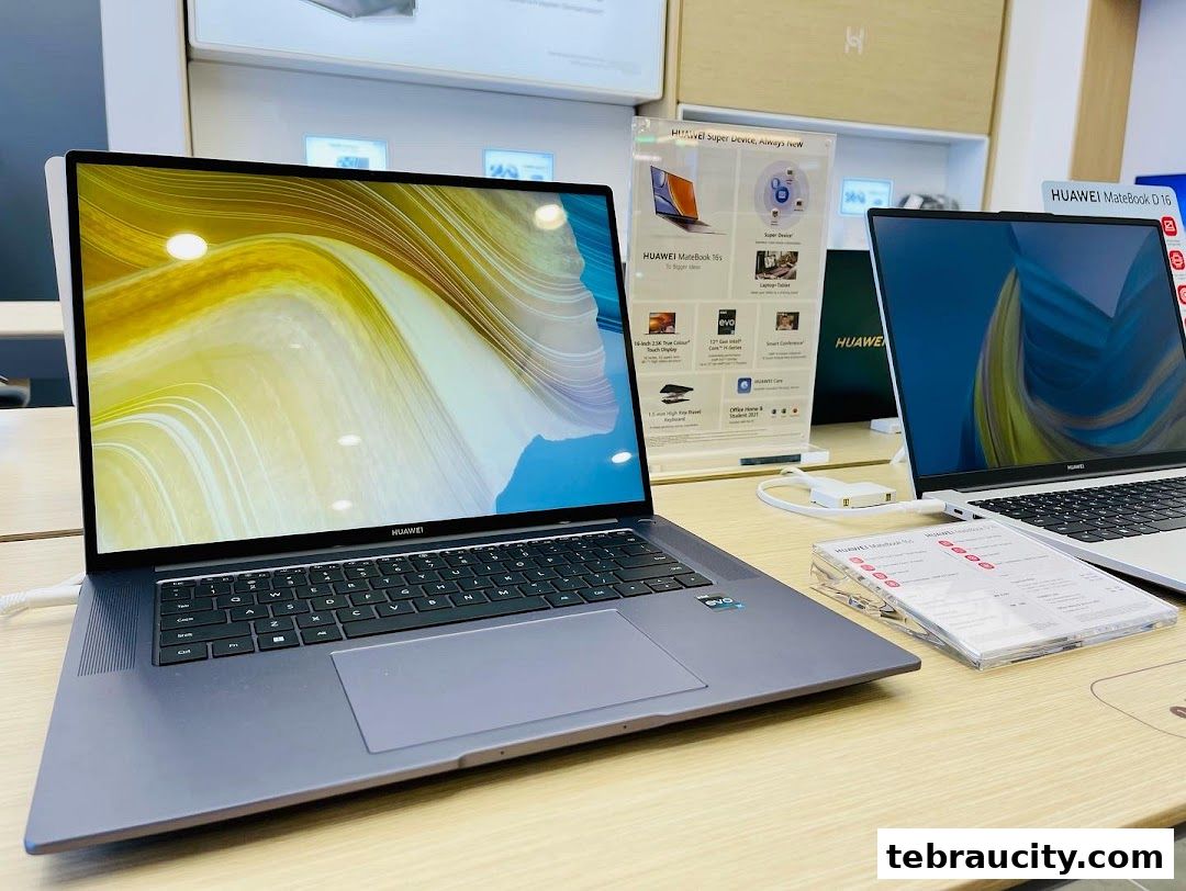 Close-up of Huawei laptops on display in a retail store, showcasing their sleek design.