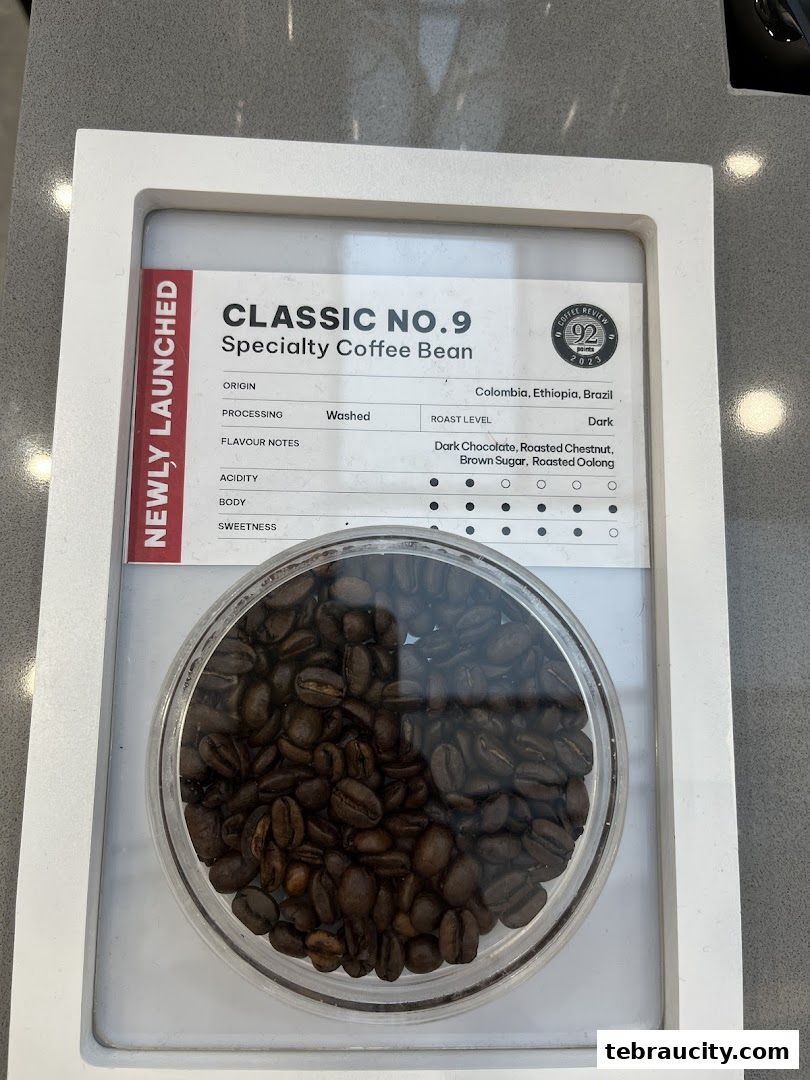 A display of 'Classic No. 9' specialty coffee beans with detailed tasting notes and origin information.