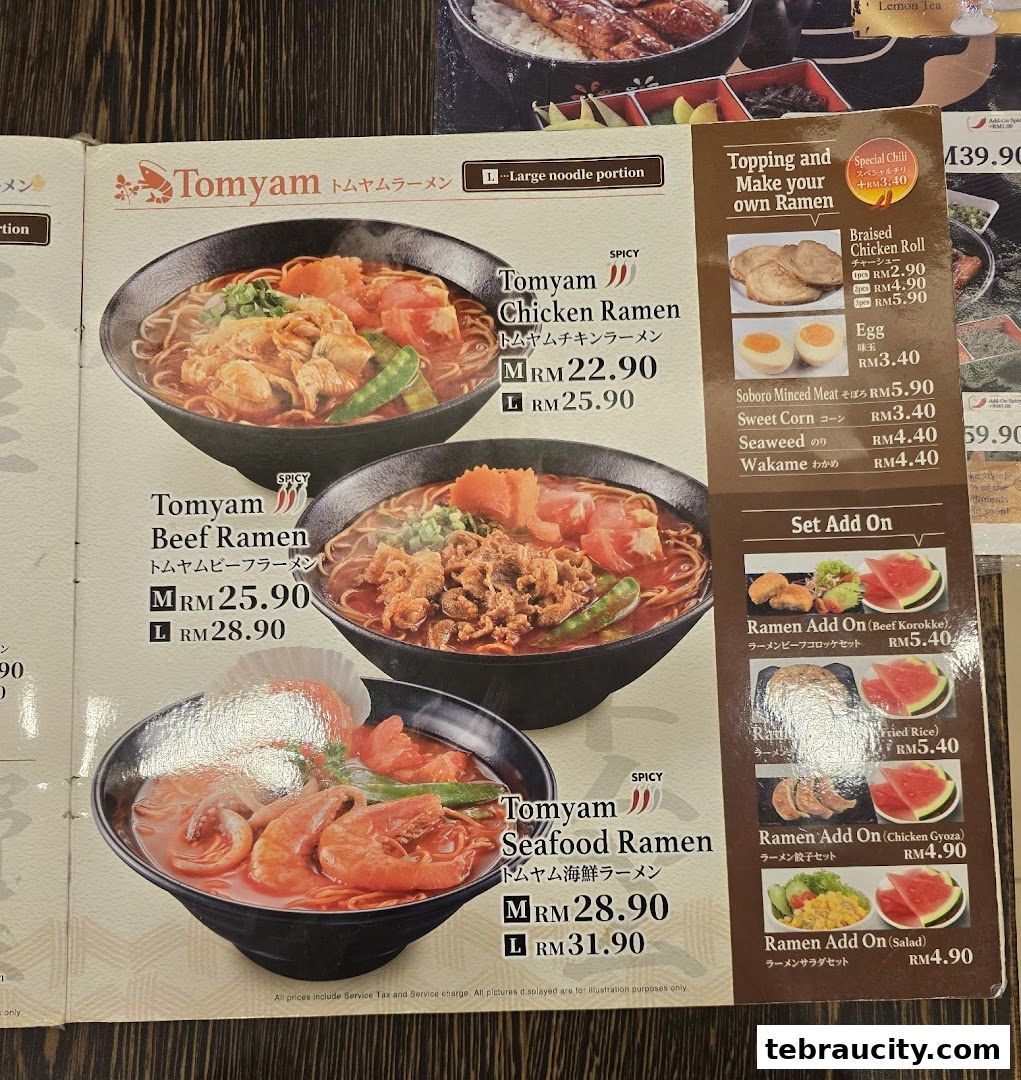 A menu featuring Tomyam Ramen dishes with various toppings and add-on options.