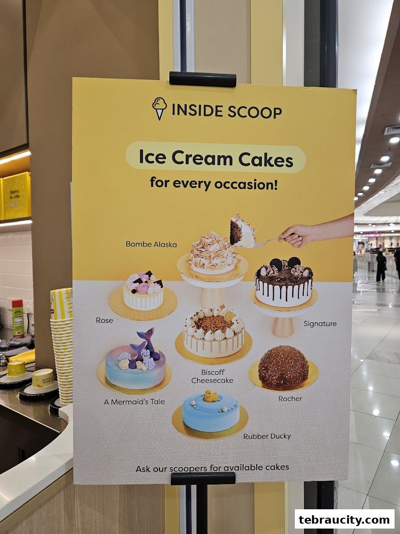 A sign showcasing various ice cream cakes offered by Inside Scoop for different occasions.