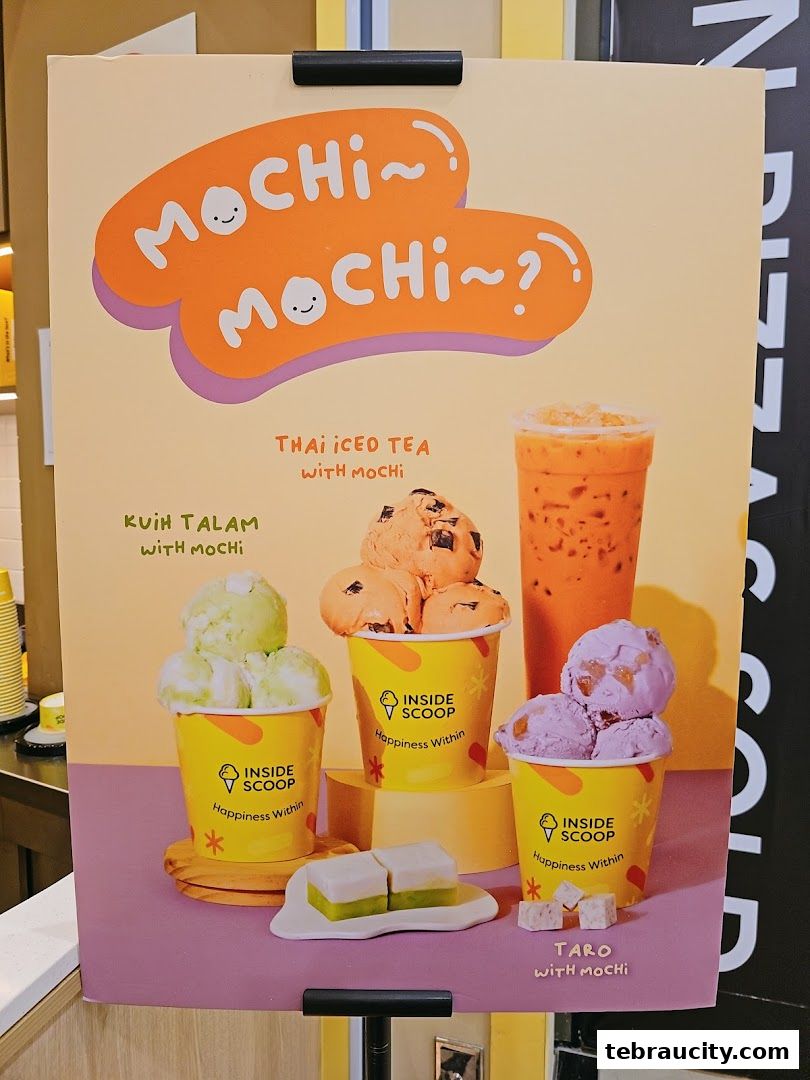 A poster advertising Inside Scoop's Mochi ice cream flavors, including Thai Iced Tea, Kuih Talam, and Taro.