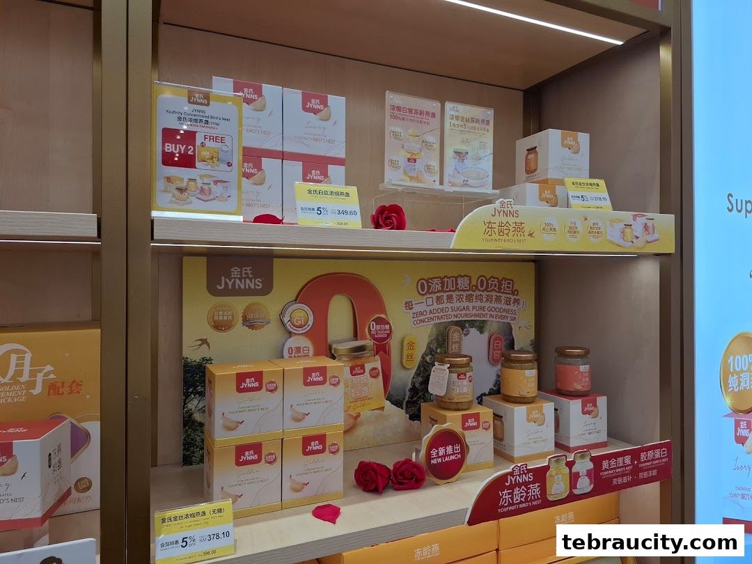 A display shelf showcasing various JYNNS bird's nest products with promotional signage.