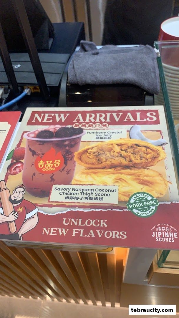A menu display featuring new arrivals: Yumberry Crystal Ice Jelly and Savory Nanyang Coconut Chicken Thigh Scone.
