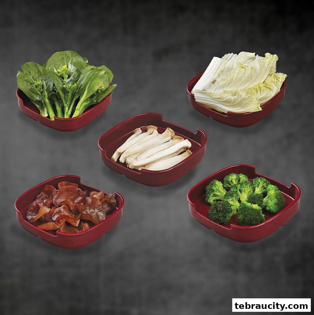 Five square red dishes filled with fresh vegetables and mushrooms.