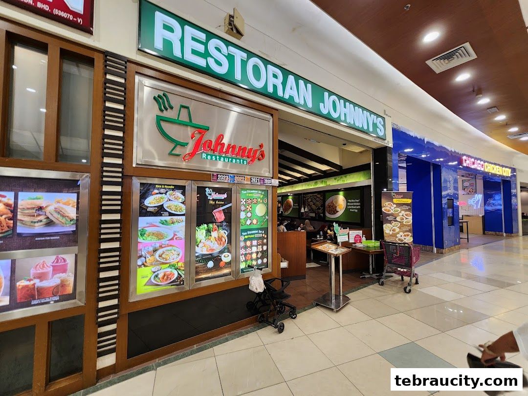 The exterior of Johnny's Restaurants, a food establishment in a shopping mall.