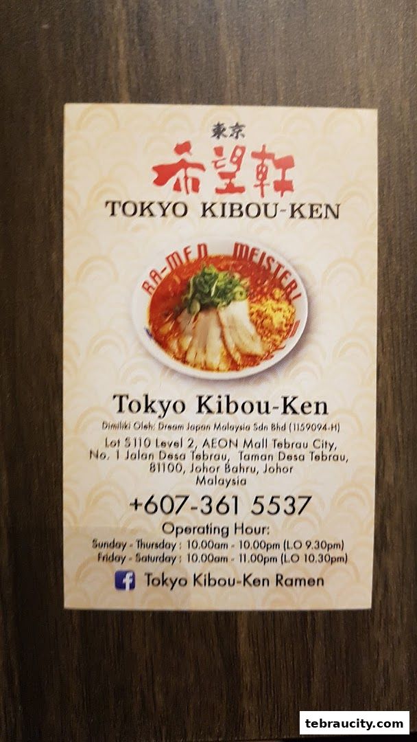A business card for Tokyo Kibou-Ken Ramen featuring a bowl of ramen and contact information.