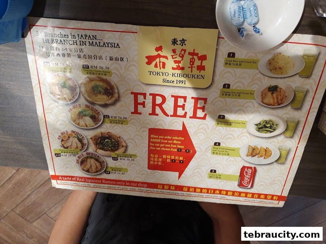 A menu from Kibou-ken featuring various ramen dishes and free item offers.