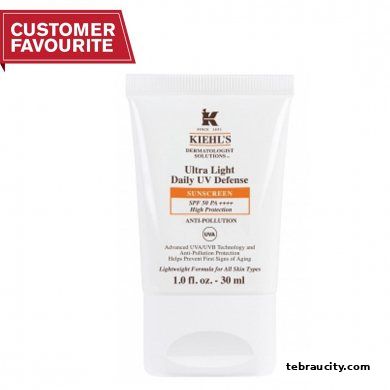 A tube of Kiehl's Ultra Light Daily UV Defense Sunscreen with SPF 50.