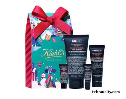 A Kiehl's gift set featuring skincare products and a festive holiday-themed box.